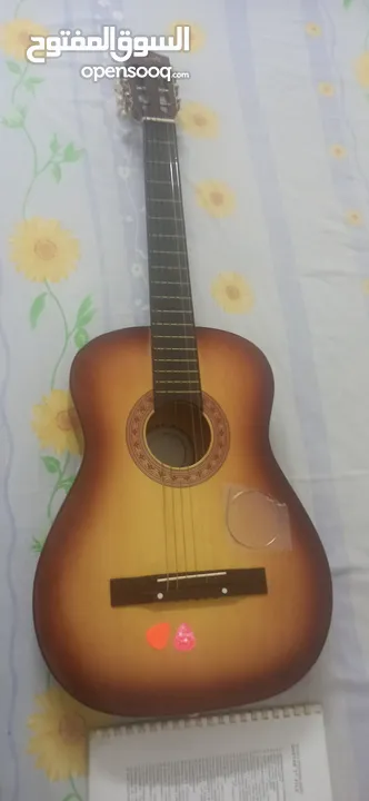 Guitar with cover - Hardly used in good condition