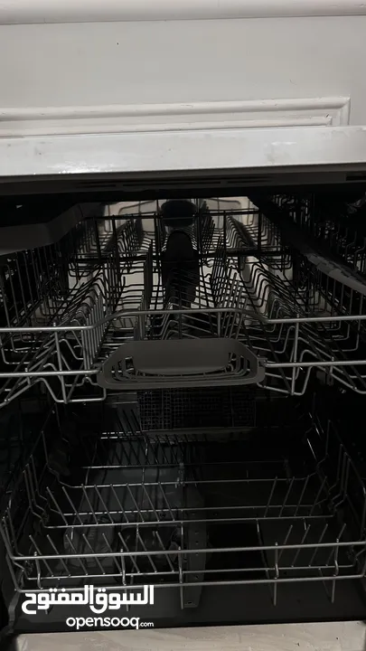 BOSCH Dishwasher use it a little bit works perfectly fine. Comes with soap.