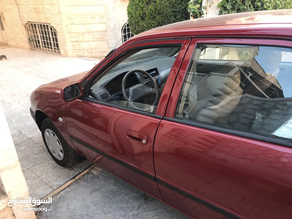 تويوتا كوروللا اوتوماتيك اصلي موديل 2000