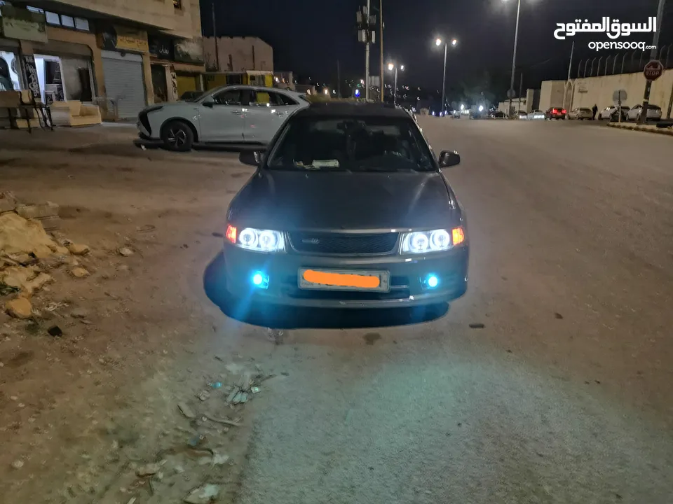لانسر موديل  99 توماتيك وارد  خليجي ماتور 1500دبل كام شفت اللي ناوي ما بقصر معه بعيد عن تجار