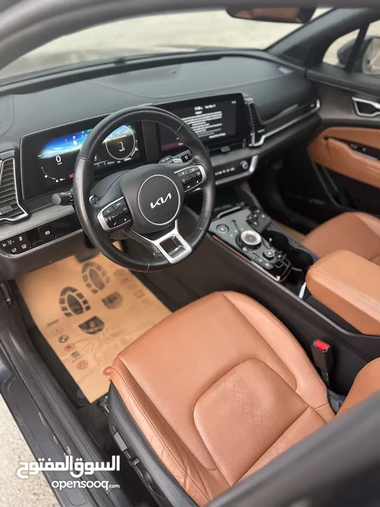 كيا سبورتاج هايبرد 2023 / فل كامل مع بانوراما وفرش مميز غرفه عسليه / عداد قليل / سعررر مميز جداً
