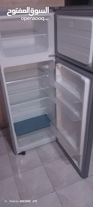 ثلاجه نوع تاشونال  ديموند 10 قدم استعمال بسيط وبحاله ممتازة مش نو فرست  لون سلفر للبيع