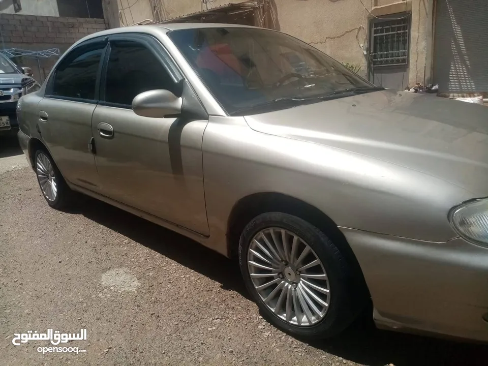 كيا 2 قير عادي مرخصه سنه للبدل على سياره  اتماتيك