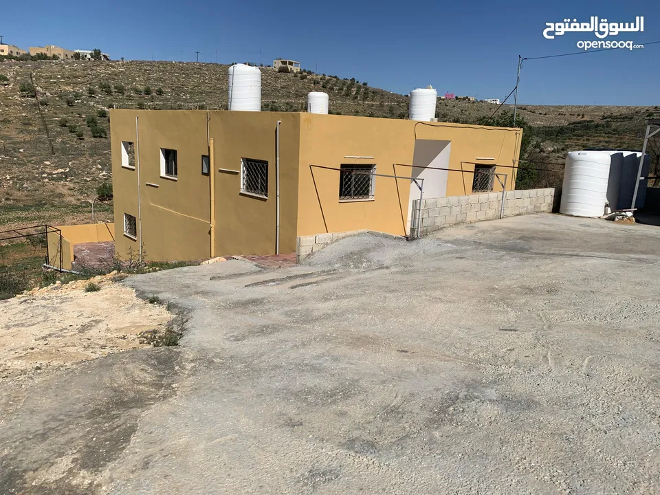 منزل ومزرعة للبيع في منطقة المريجمة-مادبا