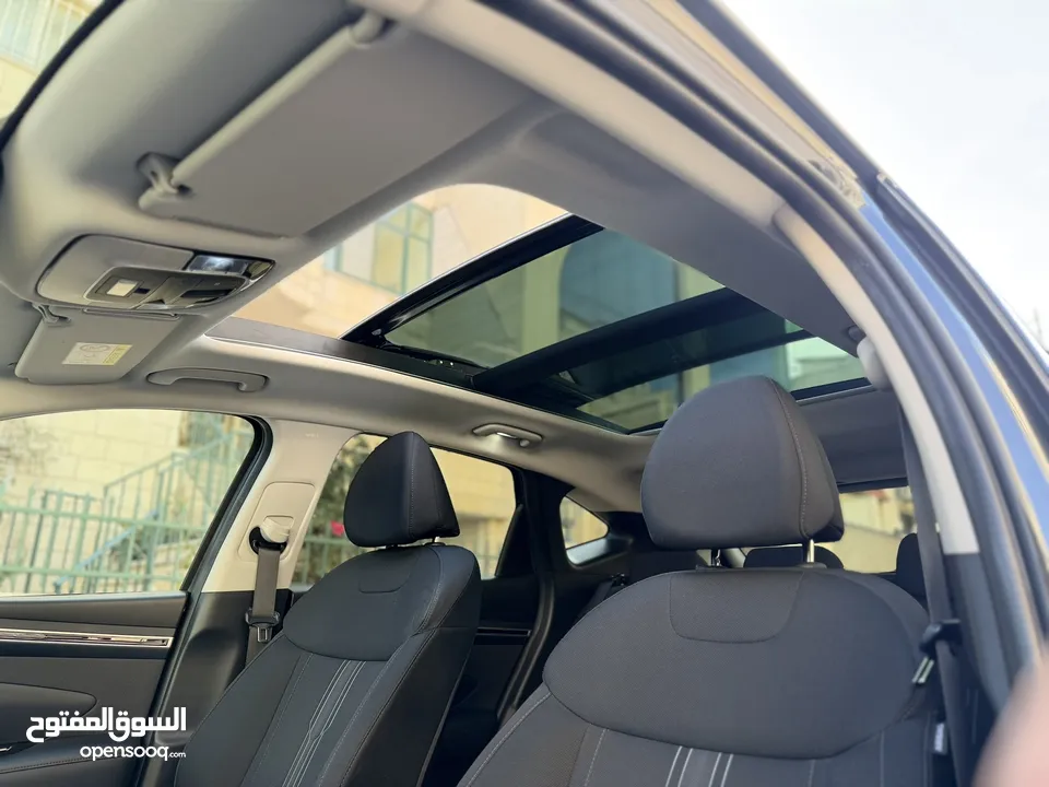 هونداي توسان 2022 هايبرد plug in 4*4 فل اضافات مع بانوراما 271 حصان