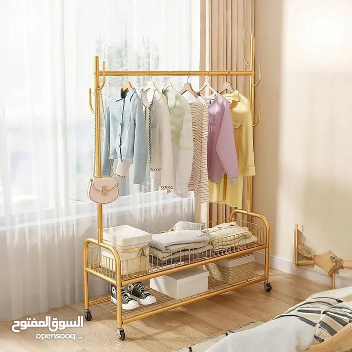 ستاند الملابس الذهبي رَتّب غرفتك وعِش أجواء الفخامة  علّق الجواكت والفساتين بكل أريحية