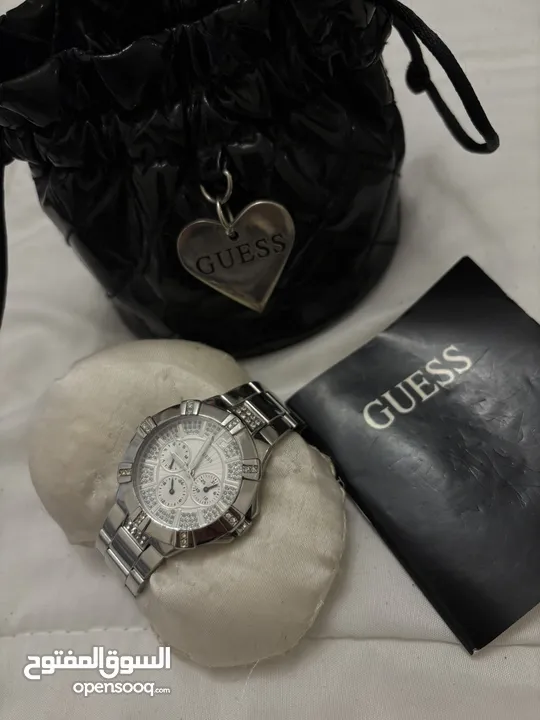 ساعه guess اصليه لون فضي