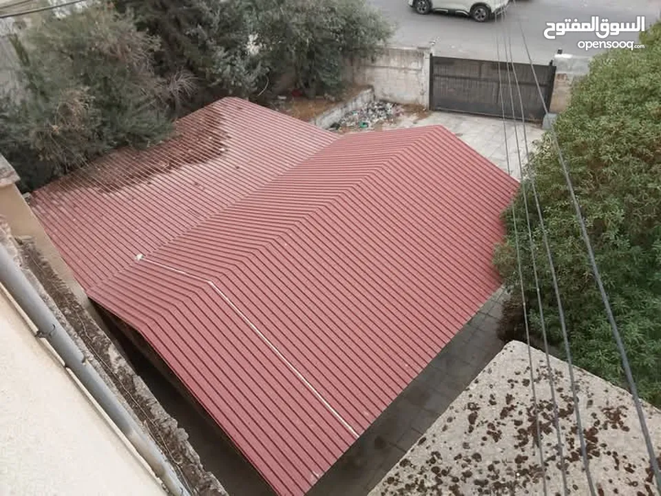 عمارة 4 طوابق للبيع في حي نزال على دونم ارض تحتوي 8 شقق وروف من المالك