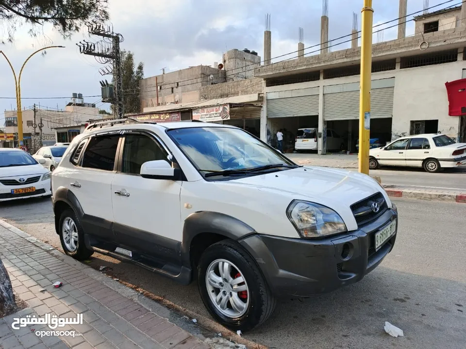 جب توسان 2005بصلاة على النبي الجب بوضعية ممتازة قوة متور 2000 +16صباب مو 20 متور وجير ممتاز