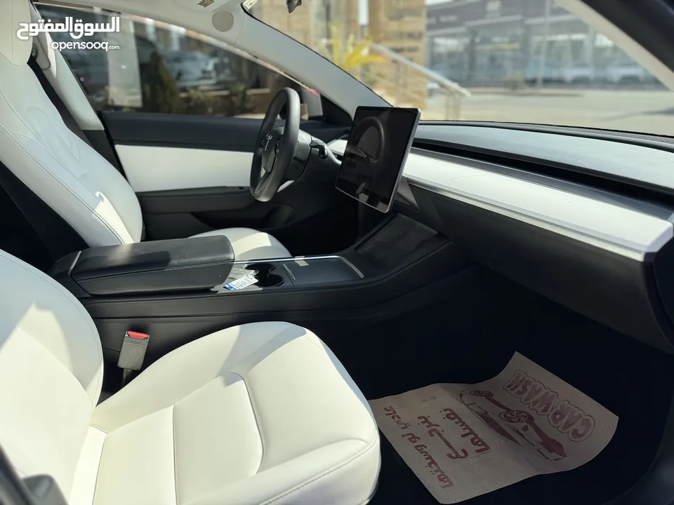 تسلا MODEl مج 3 موديل 2021 ستاندر بلس خمري داخل ابيض بحالة الوكاله فحص كامل حرره