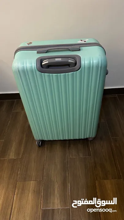 ‏شنطة سفر كبيرة  travel suitcase