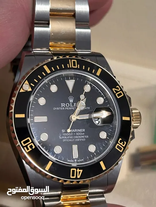 ساعة Rolex Submariner Silver and Gold Oyster Bracelet wBlack Bezel فيرست كوبي