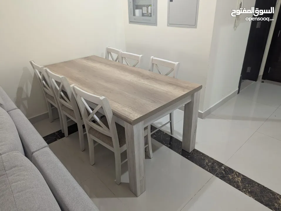 6 - Seater Dining Table with chairs. No scratches or damage.