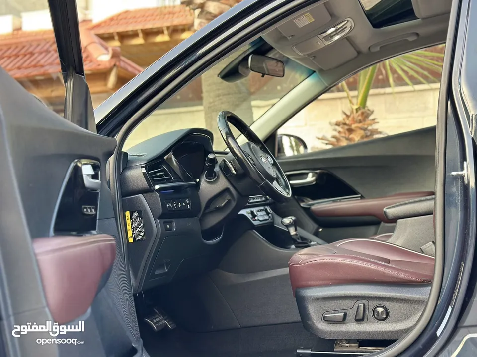 كيا نيرو هايبرد 2020 تورنج فل الفل كاش او اقساط غرفه مميزه لون خمري فتحه