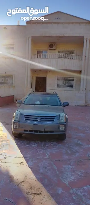 سيارة كاديلاك بحالة ممتازة للبيع بسعر مميز فحص كامل 7 جيد للجادين