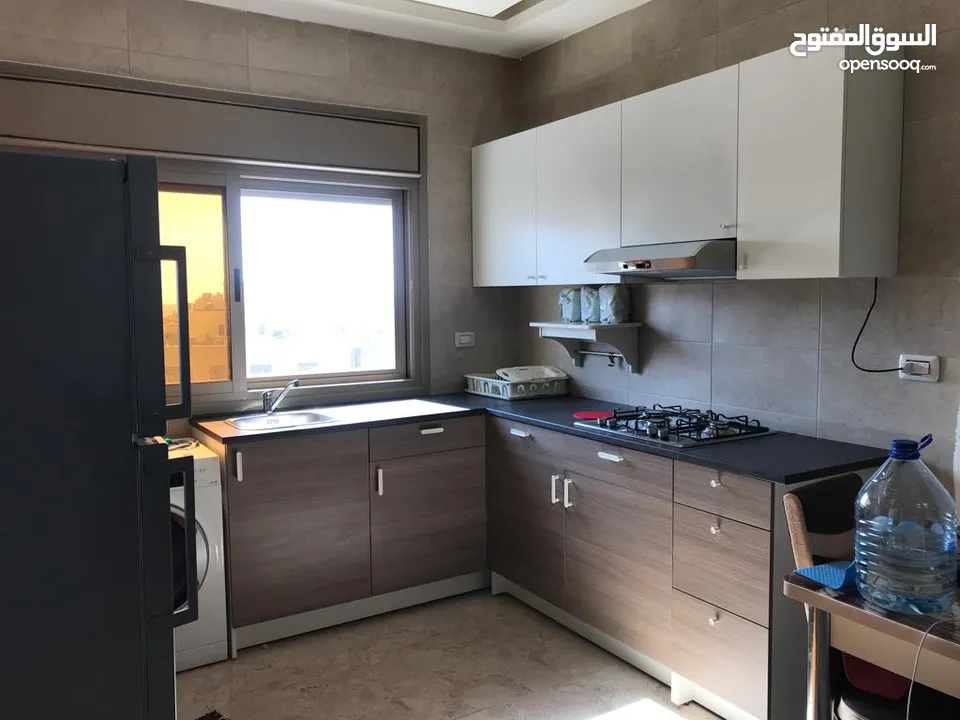 شقة راقية مفروشة للإيجار مقابل البوابة الشمالية - Modern furnished apartment for rent