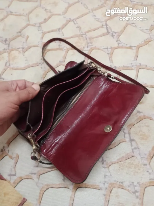 شنطة وحقيبة جلدية فاخرة وانيقة للسيدات بلون خمري أنيق مصنوعة من الجلد الأصلي الطبيعي 100 %