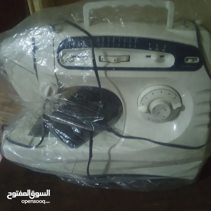 ماكينة خياطة سنجر بحالة الوكالة