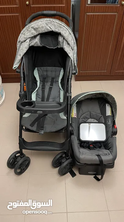 Graco baby stroller + Car seat + base for baby