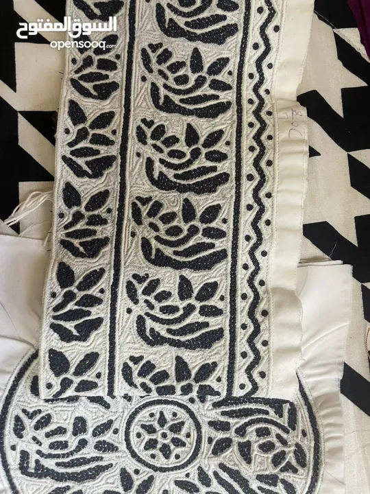 كمة عمانية، خياطة يد ، غرزة نص نجم