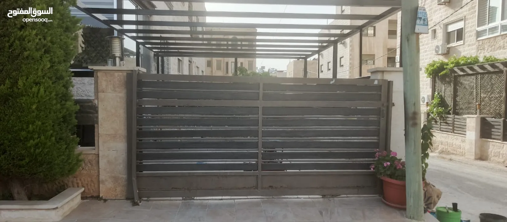 بواب حديد خارجيه ثقيله شبه جديده