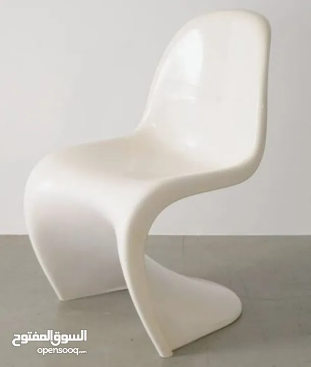 4 White Authentic Verner Panton (by Vitra) Chairs.