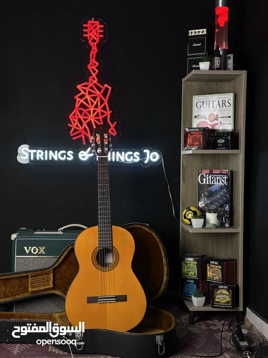 Yamaha CGX102 Plugged Classical Guitar with hardcase – 350 JDs