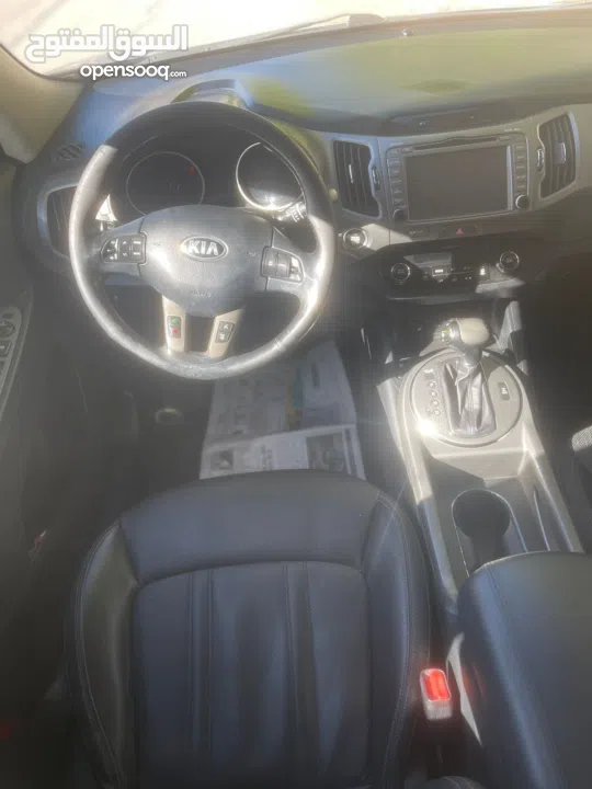 كيا سبورتاج فل الفل ما عدا فتحه ترخيص 2014  الجيب بوضع الشركة