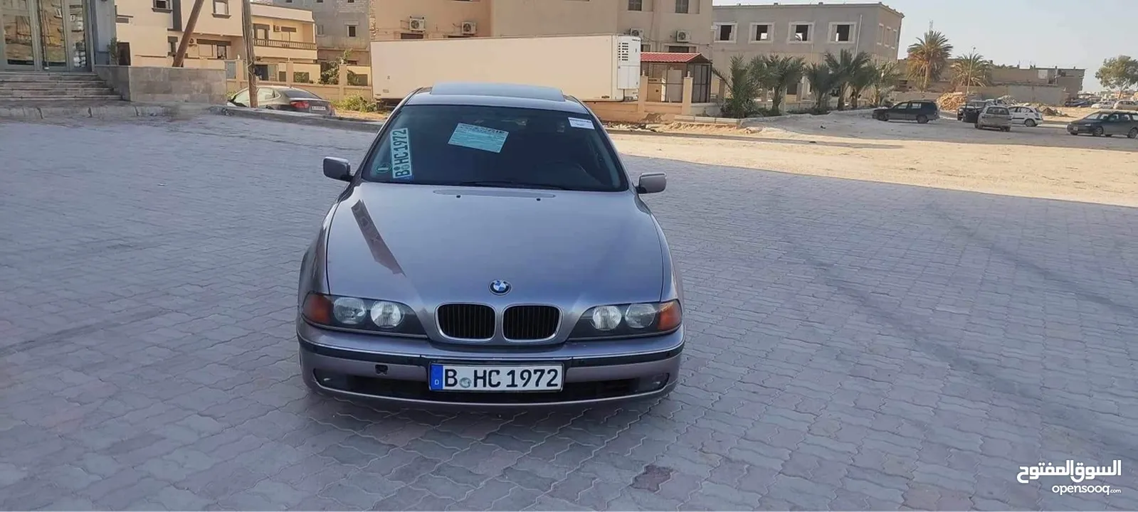 Bmw528i  جلد خمري كربون اصلي