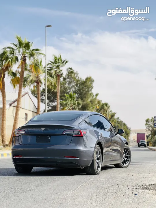 Tesla model 3 /2022 standard plus تيسلا موديل 3 لون فيراني داخلية اسود