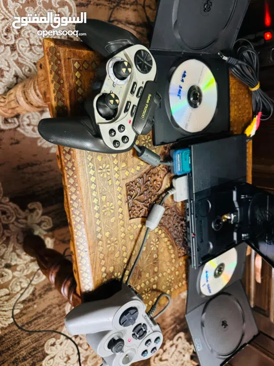 Playstation 2 Slim  بلاستيشن 2 سلم