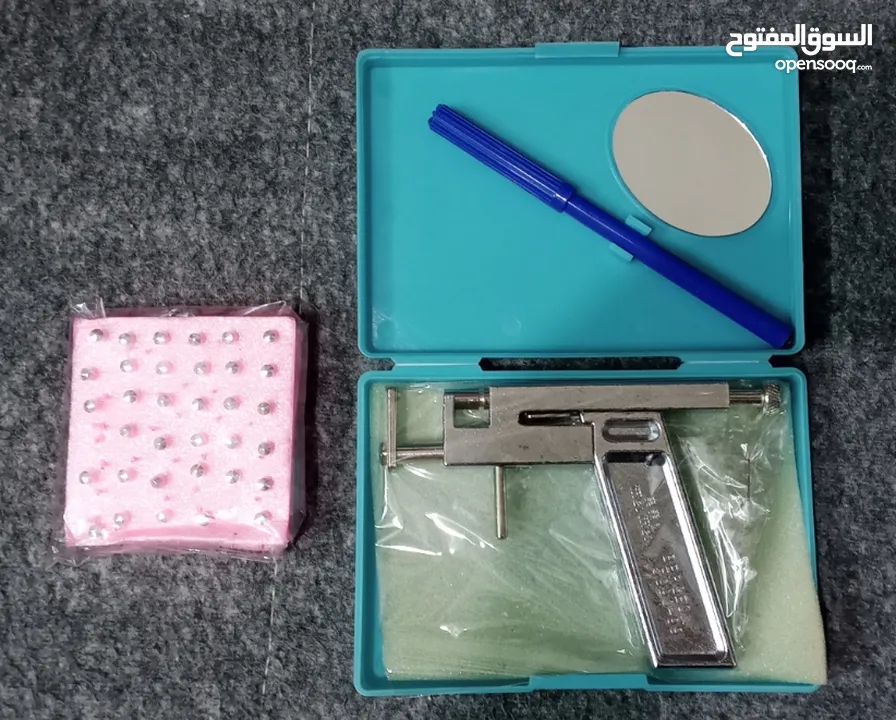 جهاز اداه ثقب الاذن و الانف مثقب اذن طبي مع دبابيس ثقب