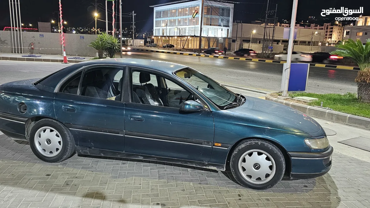 اوبل اوميجا للبيع السياره ب حاجه ل صيانه (القير + صنوبرصات) كاوشك جديد كراسي كهرباء السياره فحص خالي