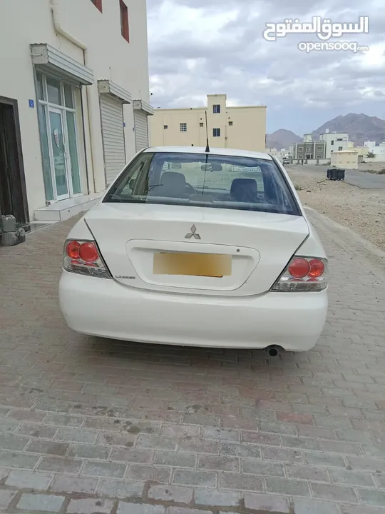 An automatic mitsubishi lancer 1.3 near and clean economical car