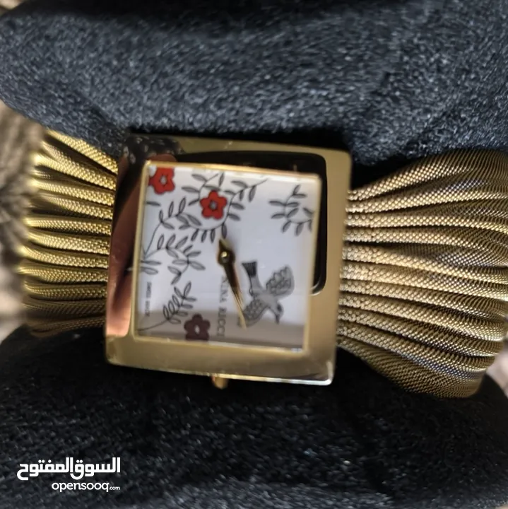 ساعه نينا ريتشي مطليه ذهب مميزه جدا