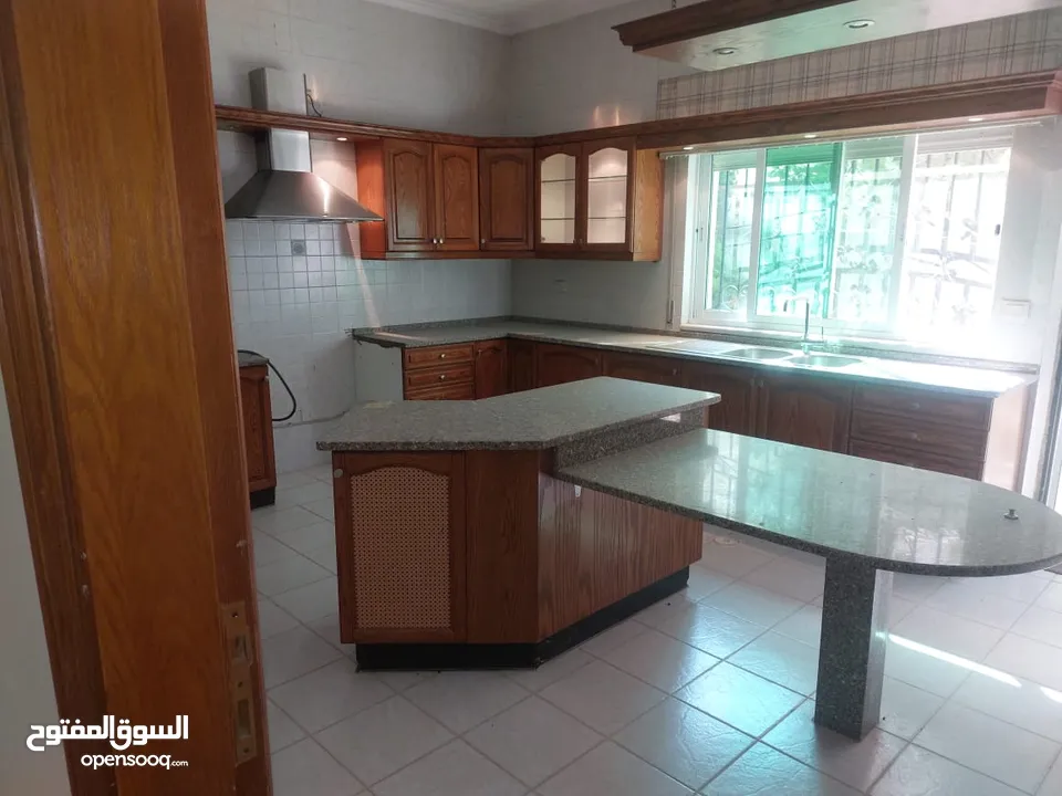 شقة ارضية في دير غبار للبيع - ref : 14405
