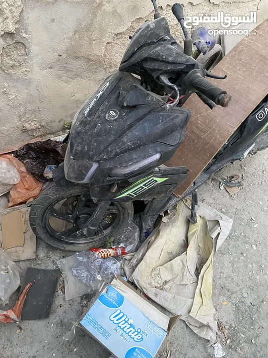 سكوتر Qj للبيع كاش بحاجة إلى صيانة