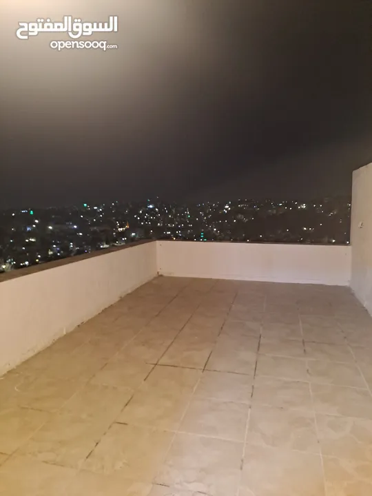 روف مفروش في عبدون مع ترس واسع