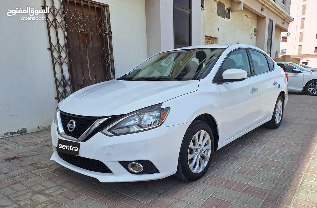 Nissan Sentra 2017 with Sunroof neat and clean. Sohar