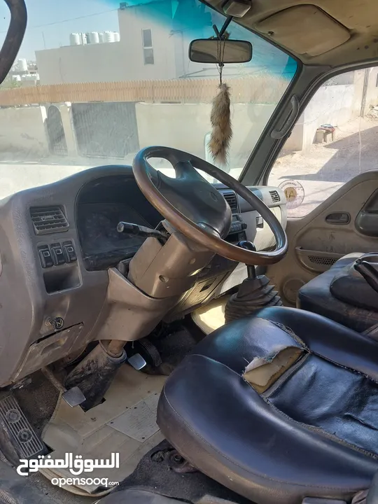 كيا بنقو 2002