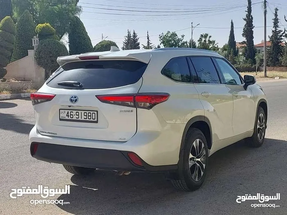 تويوتا هايلاندر 2021 فحص 2 جيد فل الفل بفتحه لون ابيض لؤلؤي بسعر مغري قابل للبدل
