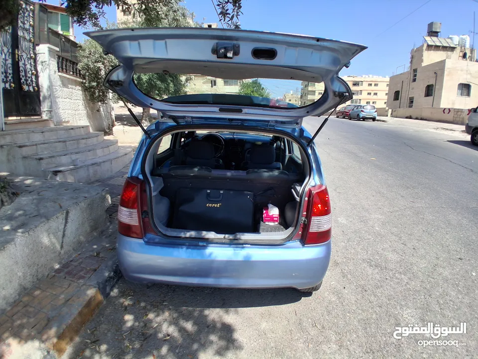 كيا بيكانتو فئة LX لون ازرق قصة الدب هاتش باق المميزه