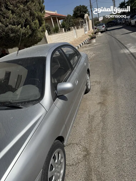 كيا ريو بحالة ممتازة  جير عادي 2004