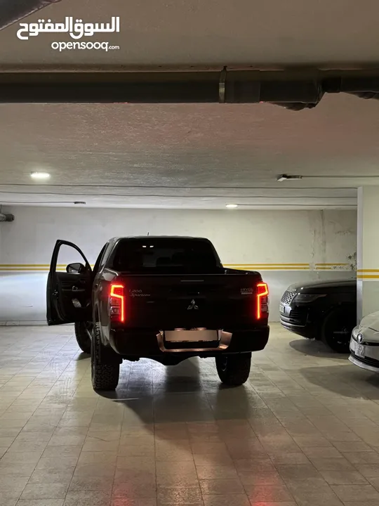 معدل Mitsubishi L200 sportero 2023 وارد و كفالة الوكالة اعلى صنف