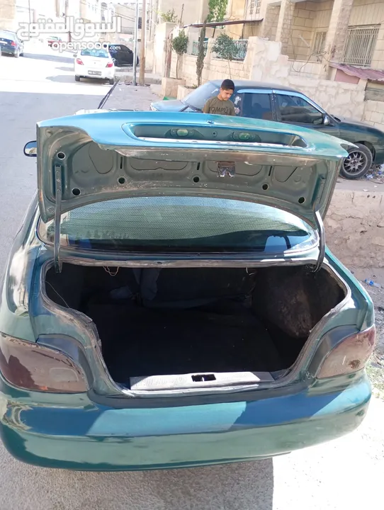 هونداي اكسنت توماتيك اصلي موديل 95 مكيف ثلاجه ترخيص شهر 3/2026 سياره زي ما بالصور واحلى
