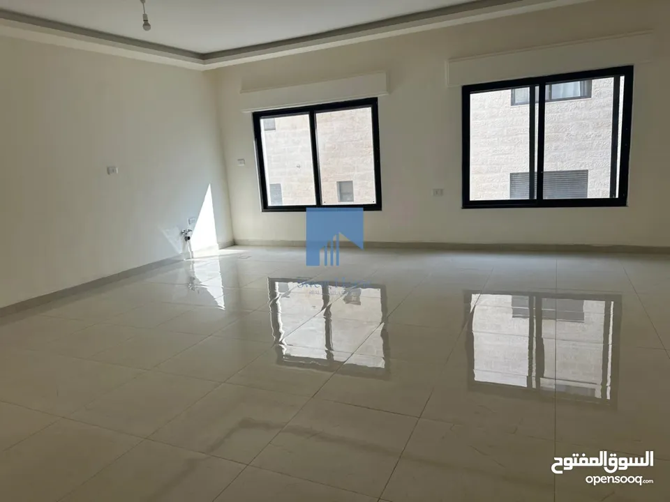 شقة أرضية فاخرة للبيع في عبدون  - خلف البلوفيج 105م تشطيب سوبر ديلوكس لم تسكن بسعر مغري