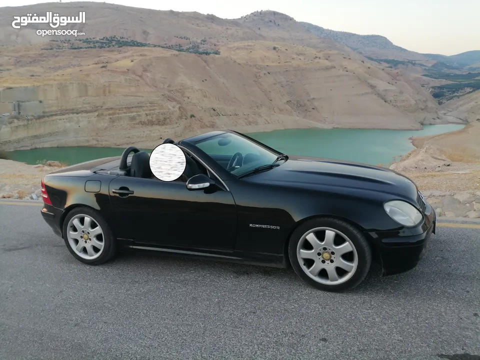 مرسيدس SLK 2003 لون أسود ملوكي، كشف، ترخيص جديد وارد غرغور مالك ثالث من الوكالة