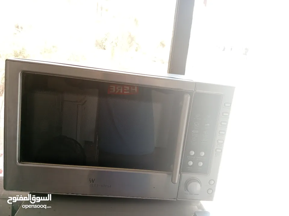 ميكرويف مع فرن حجم كبير/شغال 100/100لون سلفر للبيع المستعجل