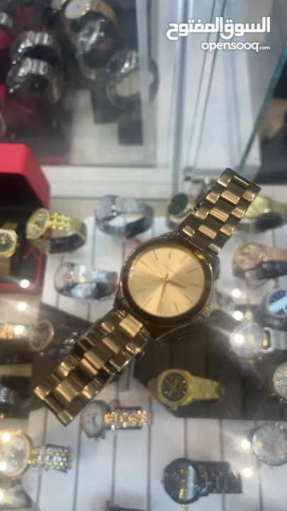 Micheal Kors watch for women Gold and silver CASH ONLY.