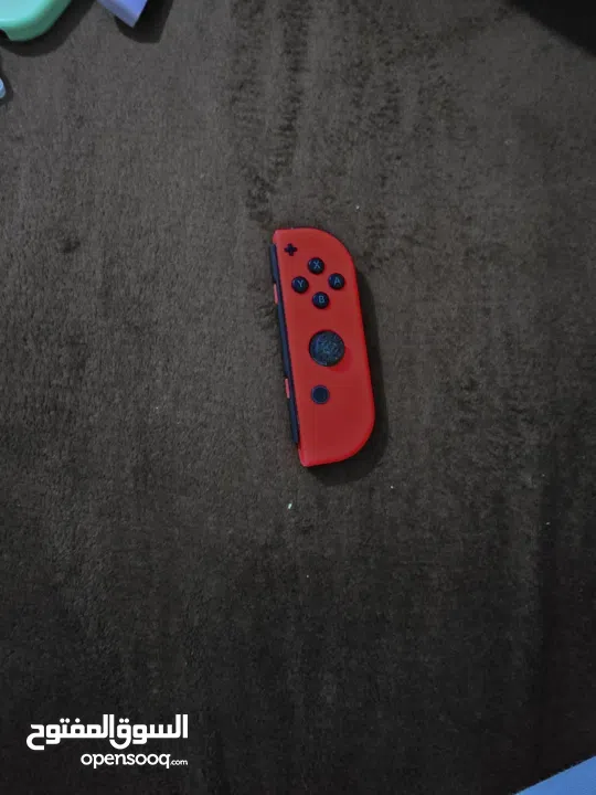 نينتندو سويتش مع 5 العاب super mario party و super mario wonder و super mario 3d world و ايد وكنترول